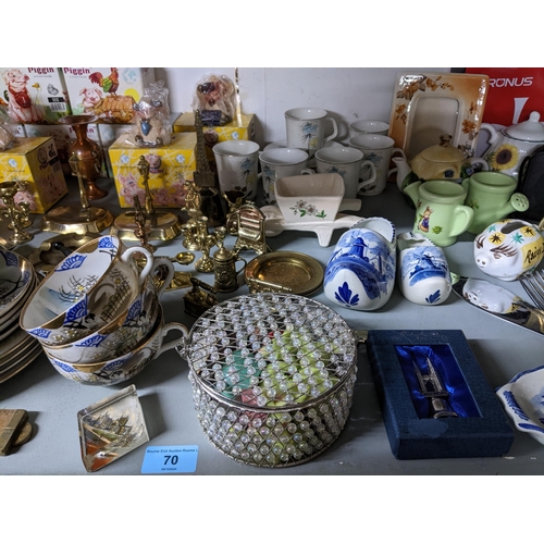 70 - A mixed lot to include a Carlton suitcase, a Ginni handbag in dust bag, various ornaments including ... 