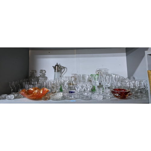 76 - A quantity of table glass to include Victorian drinking glasses, silver plate and glass claret jug, ... 