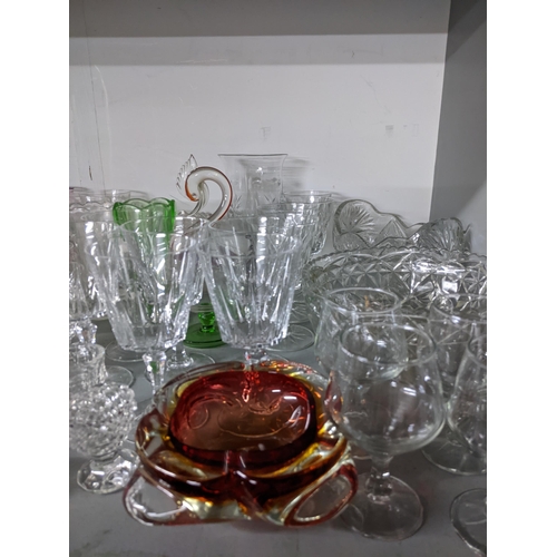 76 - A quantity of table glass to include Victorian drinking glasses, silver plate and glass claret jug, ... 