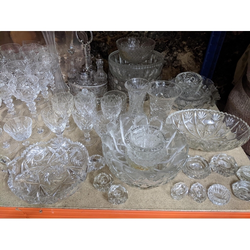 92 - A selection of cut table glass, silver plate, and other items to include a plated tray, and cased cu... 