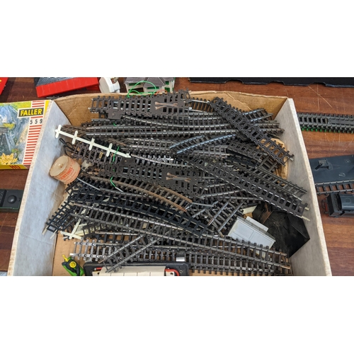 314 - Model railway equipment to include track, controllers, buildings, platform and locomotives A/F Locat... 