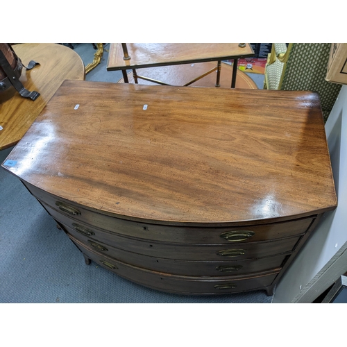 340 - A mid/late Victorian mahogany bow fronted chest of drawers with four graduating drawers with brass h... 