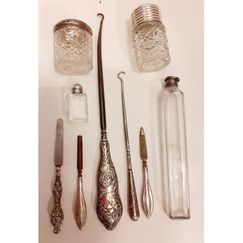 113 - A group of silver, white metal and glass dressing table and boudoir items to include 2 button hooks,... 