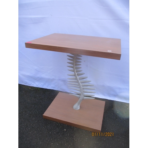 196 - A contemporary table having a support in the form of a fish skeleton 76.5cm h x 64cm w
Location: BWR... 