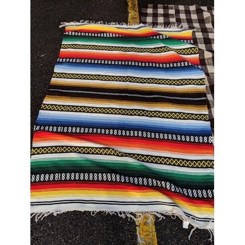 139 - A native American blanket, a vintage brown and white check blanket, a small Chinese mat, a Kelim mat... 