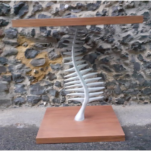 196 - A contemporary table having a support in the form of a fish skeleton 76.5cm h x 64cm w
Location: BWR... 