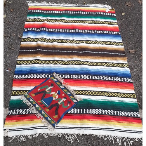 139 - A native American blanket, a vintage brown and white check blanket, a small Chinese mat, a Kelim mat... 