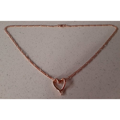 19 - A 9ct rose gold chain 5g with a 14ct rose gold heart shaped pendant 1.68g Location:  CAB 2
If there ... 