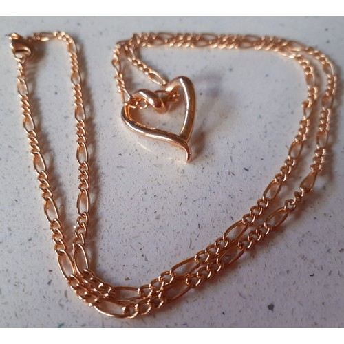 19 - A 9ct rose gold chain 5g with a 14ct rose gold heart shaped pendant 1.68g Location:  CAB 2
If there ... 