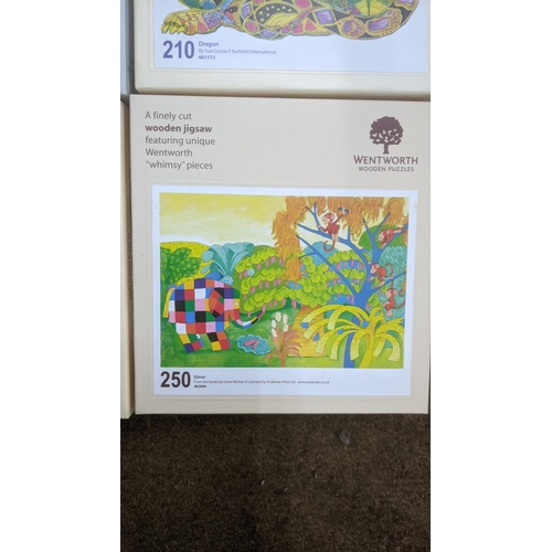 379 - Nine Wentworth wooden jigsaw puzzles to include animal related examples to include Elmer 250 pieces,... 