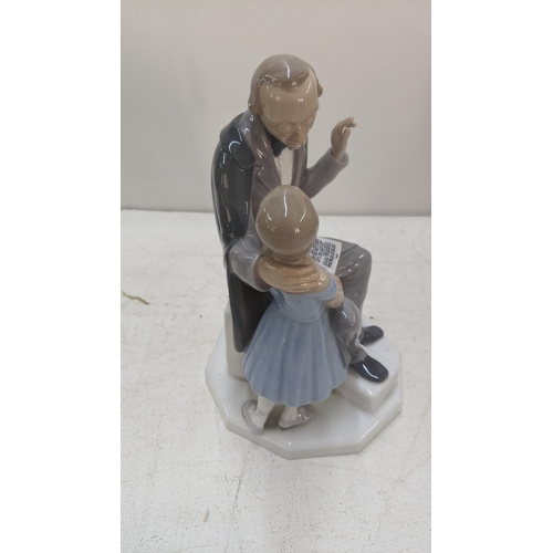 384 - A Bing and Grondahl figure Hans Christian Andersen telling his stories to a girl No.2037 23cm h Loca... 