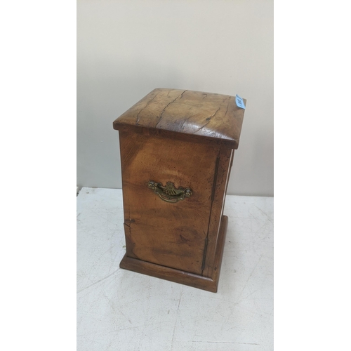 385 - A Victorian walnut collector's chest with three drawers and a door inset with a Gothic glass panel w... 