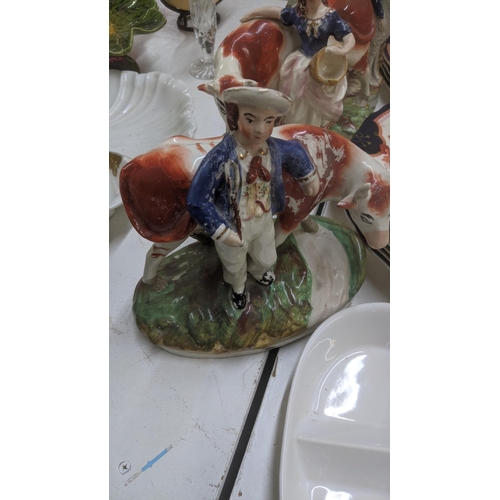 387 - Mixed ceramics to include 19th century Staffordshire pottery to include a pair milk boy and milk gir... 