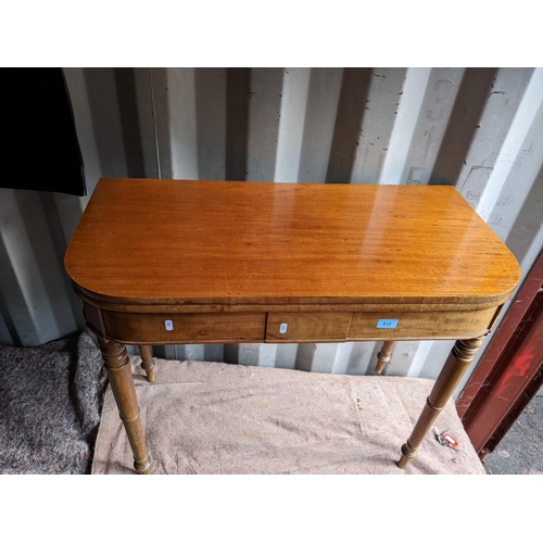 512 - A 19th century mahogany card table with a fold-over top, on turned legs, 73cm h x 90cm w
Location: R... 