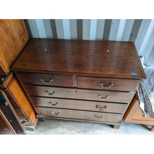 513 - A 19th century oak chest of two short and three graduated long drawers, on bracket  feet, 102cm h x ... 