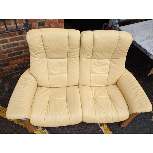 525 - A Stressless cream/yellow leather upholstered two-person sofa Location: A2B
If there is no condition... 