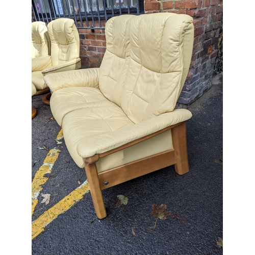 525 - A Stressless cream/yellow leather upholstered two-person sofa Location: A2B
If there is no condition... 