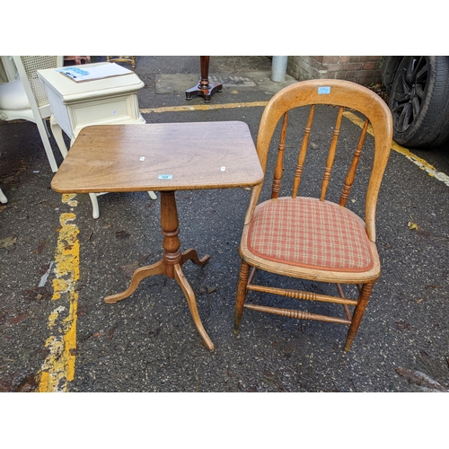 528 - A 19th century mahogany pedestal table and an oak, spindle back chair
Location: RED CON
If there is ... 