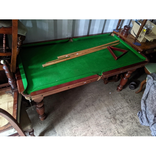 533 - An early 20th century William Burgess, London mahogany snooker/billiards/dining tables on turned leg... 