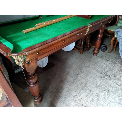 533 - An early 20th century William Burgess, London mahogany snooker/billiards/dining tables on turned leg... 