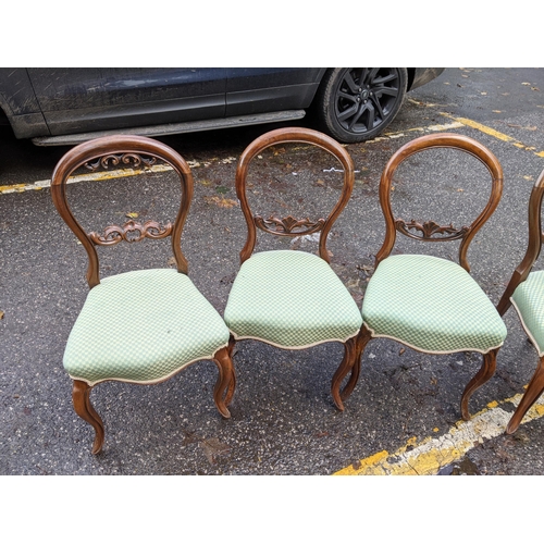 535 - Six similar Victorian walnut framed balloon back chairs with upholstered seats, on cabriole legs
Loc... 