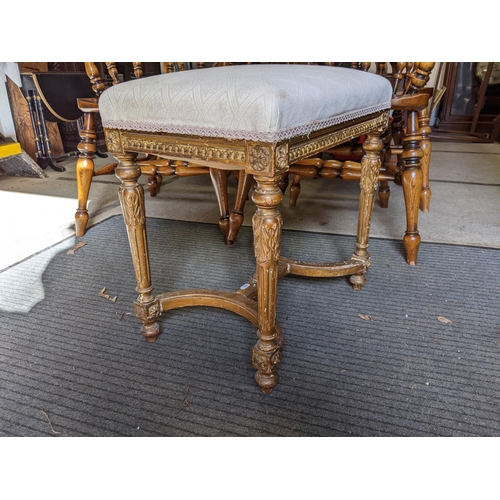 540 - A 19th century gilt wood stool with an upholstered top, on turned fluted legs, 52cm h x 50cm w
Locat... 