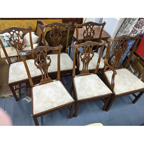 564 - A set of six reproduction Chippendale style dining chairs with drop in seats, on square legs
Locatio... 