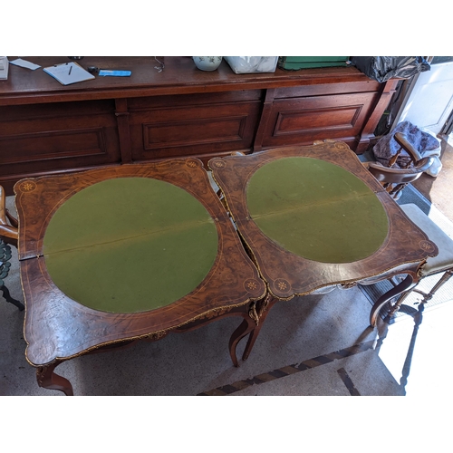 572 - A pair of reproduction Louis XV style inlaid card tables with brass mounts, on cabriole legs, 77cm h... 