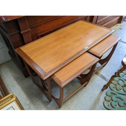 573 - A nesting set of three G-plan teak occasional tables
Location: FOYER
If there is no condition report... 