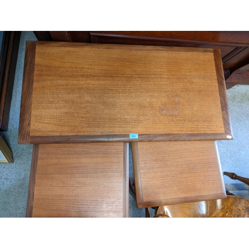 573 - A nesting set of three G-plan teak occasional tables
Location: FOYER
If there is no condition report... 