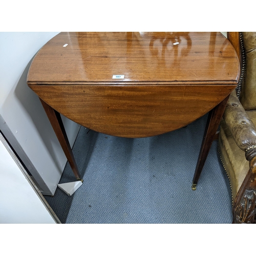 583 - An early 19th century mahogany Penbroke table, with D shaped flaps and an end drawer
Location: A1B
I... 