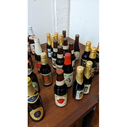 409 - A collection of 61 unopened beer bottles from breweries in the UK and from around the world to inclu... 