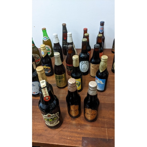 409 - A collection of 61 unopened beer bottles from breweries in the UK and from around the world to inclu... 