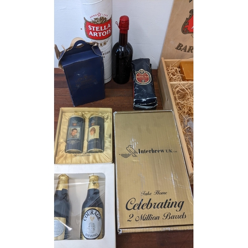 410 - A collection of commemorative beer related items to include Stella Artois 2 Million Barrels box, a W... 