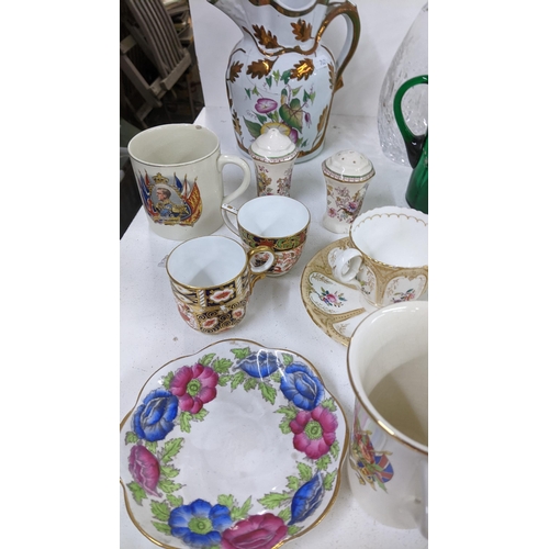 482 - A mixed lot to include Imari plates, crystal cut glasses, Royal Crown Derby mugs, a boxed jadeite se... 