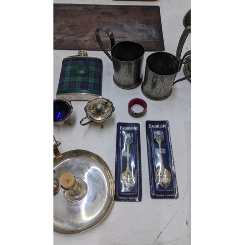 580 - A collection of metalware to include a tartan covered hip flask, a pewter tankard, an inkwell, a can... 