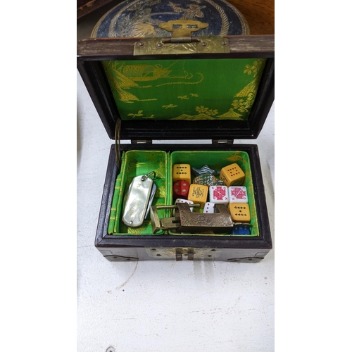 584 - A collection of storage boxes to include a tea caddy, a cigarette box, a miniature wooden pew, a car... 