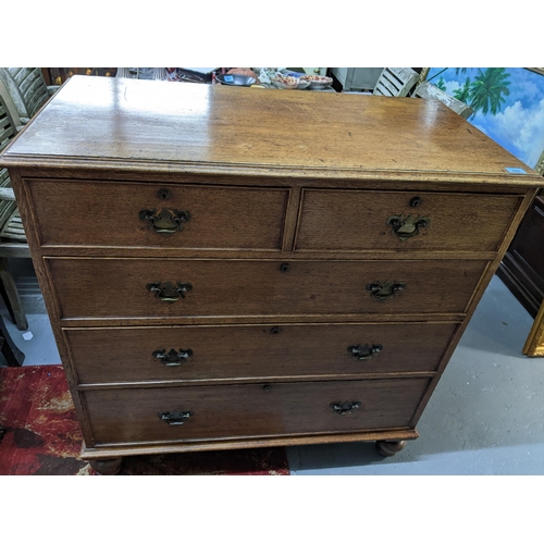 544 - A Victorian oak chest of two short and three long graduated drawers on turned feet 107cm x 103.5cm x... 