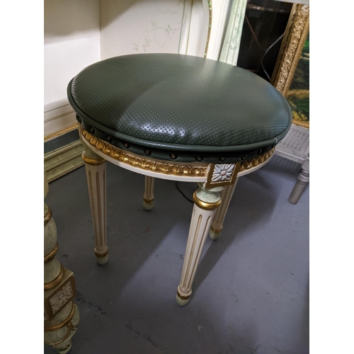 554 - A painted cream coloured dressing table with floral painted decoration, green and gilt highlights, t... 