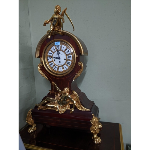 557 - An ornate and large Palais Royale Paris mechanical clock, 87cm high, the mahogany case with inlaid s... 