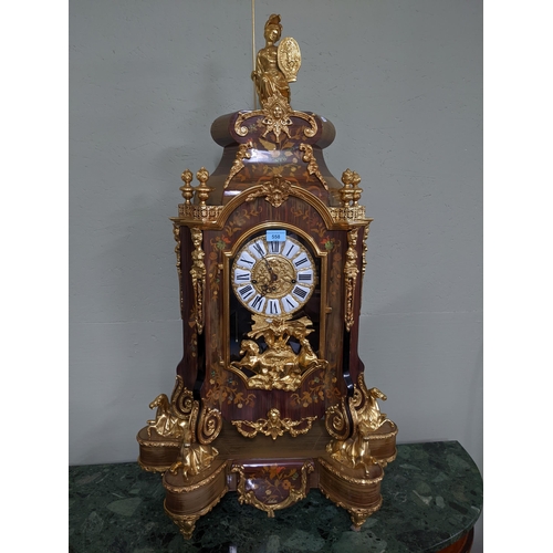 558 - Le Ore, Italian mechanical clock, inlaid wooden case having floral decoration with inset mother of p... 