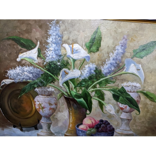 567 - A 20th century still life of Calla lily and Hyacinth flowers in a vase, fruit to one side, vases and... 