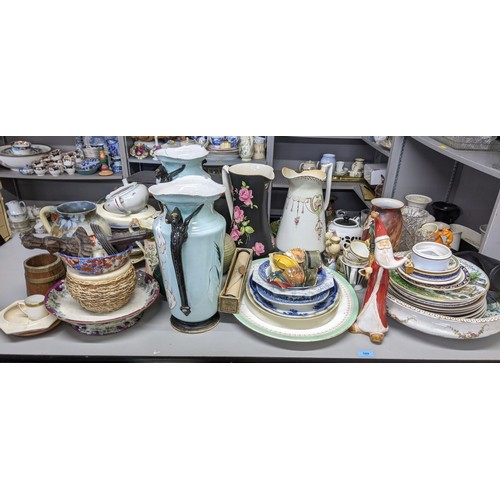 588 - A mixed lot of china and ceramics to include two twin handled vases, a large water jug and other ite... 