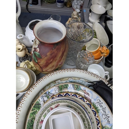 588 - A mixed lot of china and ceramics to include two twin handled vases, a large water jug and other ite... 