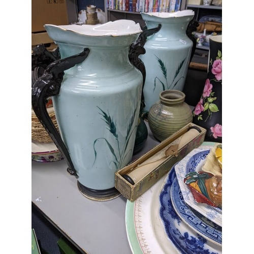 588 - A mixed lot of china and ceramics to include two twin handled vases, a large water jug and other ite... 