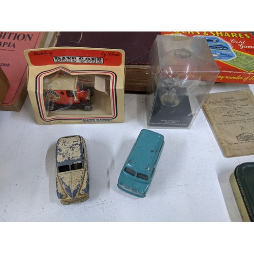 471 - A mixed lot to include a silver plated teaset, hip flask, microscope, model cars, Lucas bulb, pictur... 