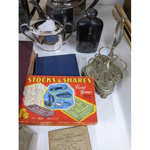 471 - A mixed lot to include a silver plated teaset, hip flask, microscope, model cars, Lucas bulb, pictur... 