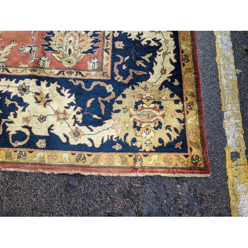 133 - A 20th century hand woven Agra carpet, floral decoration on a red ground
Location: G
If there is no ... 