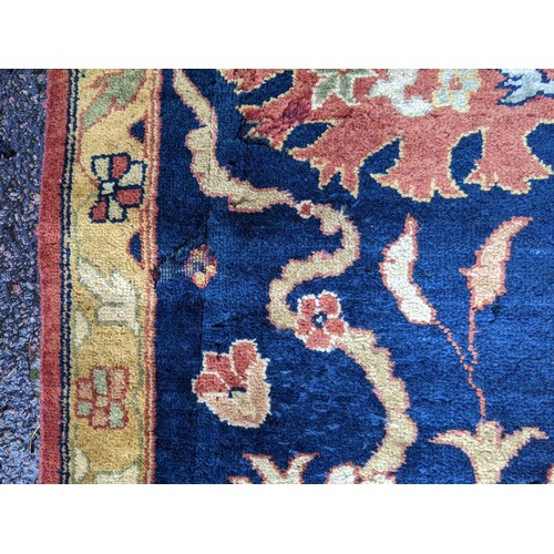 133 - A 20th century hand woven Agra carpet, floral decoration on a red ground
Location: G
If there is no ... 