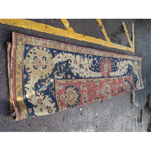 133 - A 20th century hand woven Agra carpet, floral decoration on a red ground
Location: G
If there is no ... 